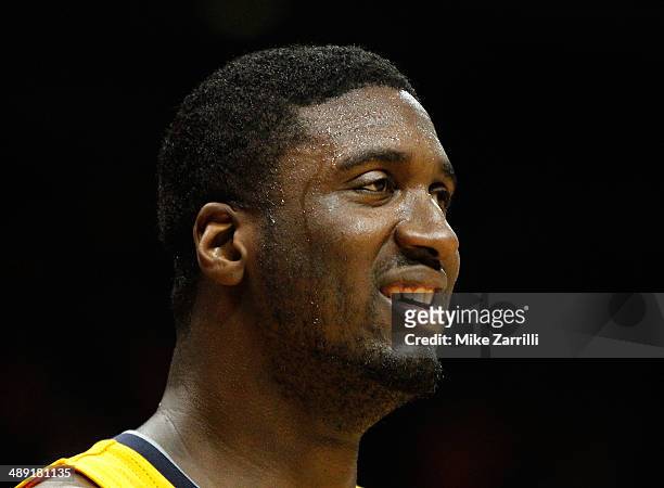 Center Roy Hibbert of the Indiana Pacers smiles at the end of Game Six of the Eastern Conference Quarterfinals against the Atlanta Hawks during the...