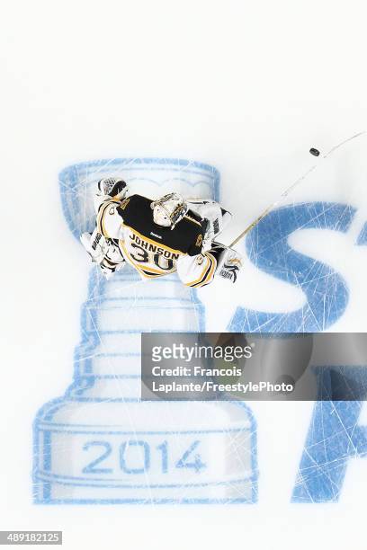 Chad Johnson of the Boston Bruins skates over the in ice Stanley Cup logo during warmup prior to Game Three of the Second Round of the 2014 NHL...