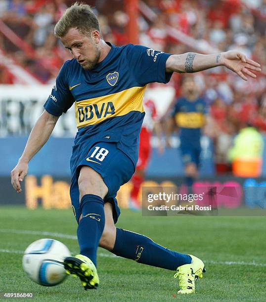 Nicolas Colazo of Boca Juniors takes a shot during a match between Argentinos Juniors and Boca Juniors as part of 25th round of Torneo Primera...