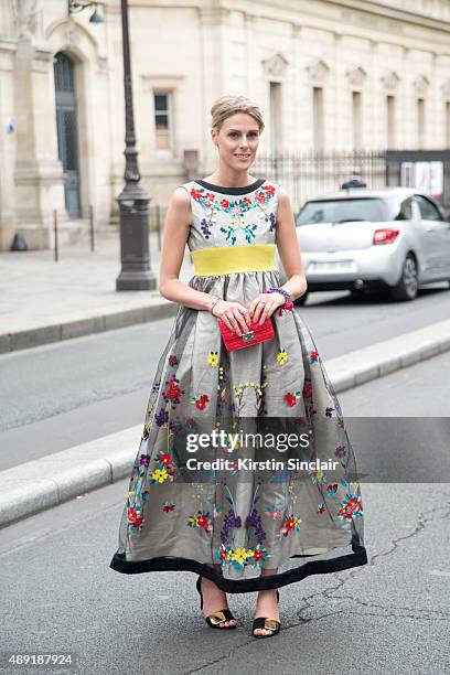 Fashion Blogger Sofie Valkiers wears an Antonio Marras dress, Pierre Hardy shoes and Dior bag on day 4 of Paris Fashion Week Haute Couture...