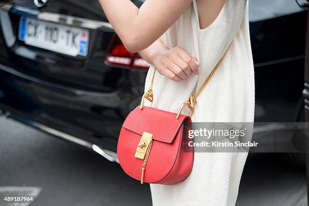 Guest wears a Chloe bag on day 4 of Paris Fashion Week Haute Couture Autumn/Winter 2015 on July 8, 2015 in Paris, France.