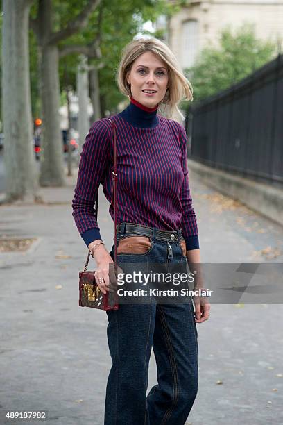 Fashion Blogger Sofie Valkiers wears Louis Vuitton jeans bag and top with Dior shoes on day 4 of Paris Fashion Week Haute Couture Autumn/Winter 2015...