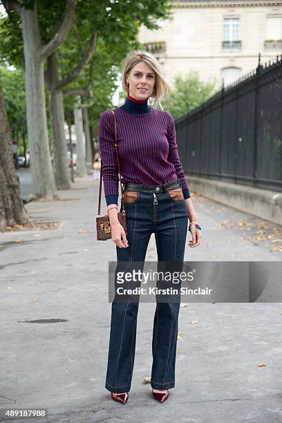 Fashion Blogger Sofie Valkiers wears Louis Vuitton jeans bag and top with Dior shoes on day 4 of Paris Fashion Week Haute Couture Autumn/Winter 2015...