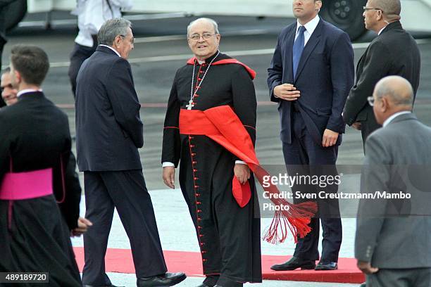 Cuba's president Raul Castro and Cuban cardinal Jaime Ortega wait for the aircraft of Pope Francis to arrive at the Jose Marti, on September 19, 2015...