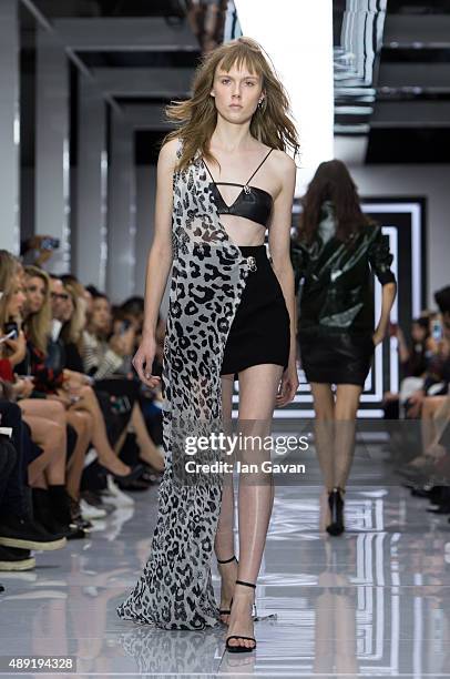 Model walks the runway at the Versus show during London Fashion Week Spring/Summer 2016/17 on September 19, 2015 in London, England.