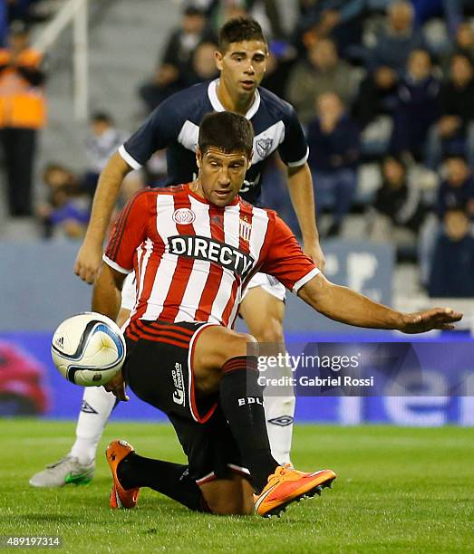 Sebastian Dominguez of Estudiantes kicks the ball during a match between Velez Sarsfield and Estudiantes as part of 25th round of Torneo Primera...