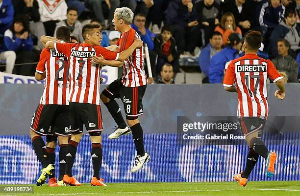Ezequiel Cerutti of Estudiantes and teammates celebrate their team's first goal during a match between Velez Sarsfield and Estudiantes as part of...