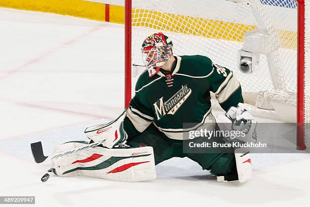 Ilya Bryzgalov of the Minnesota Wild makes a save against the Chicago Blackhawks during Game Three of the Second Round of the 2014 Stanley Cup...