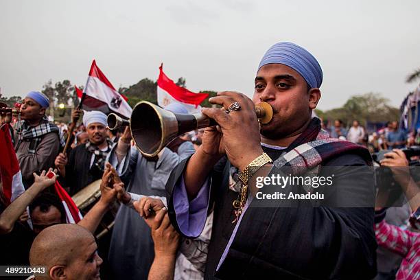 Supporters of the former Egyptian Defence Minister Abdulfattah el-Sisi attend the electoral campaign held in the district of Nasr City before the...