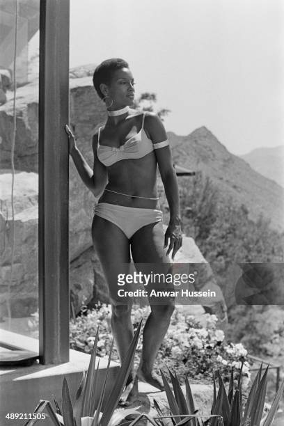 Actress Trina Parks on the set of the James Bond film 'Diamonds Are Forever', USA, 1971. She is on location at the Elrod House in Palm Springs,...