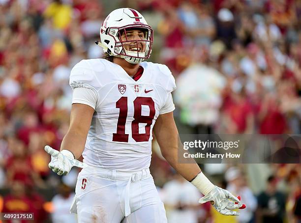 Austin Hooper of the Stanford Cardinal argues for a pass interference call during the second quarter against the USC Trojans at Los Angeles Coliseum...