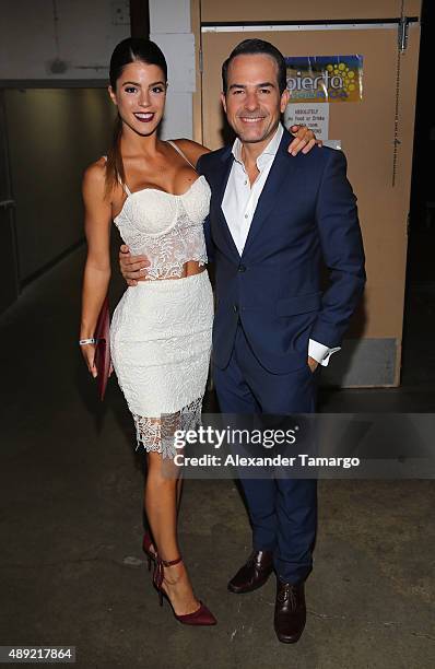 Nicole Herrera and Carlos Calderon pose in the VIP area at Univision's "Sabado Gigante" Finale at Univision Studios on September 19, 2015 in Miami,...