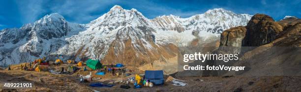 mountaineering expedition base camp panorama high in himalayas annapurna nepal - base camp stock pictures, royalty-free photos & images
