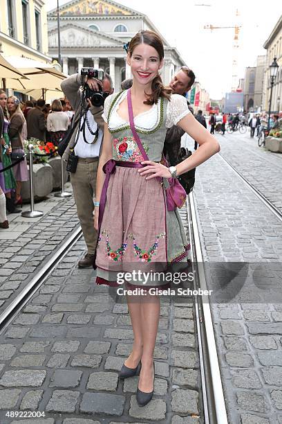Sophie Wepper wearing a dirndl by Lola Paltinger during the 'Fruehstueck bei Tiffany' at Tiffany Store ahead of the Oktoberfest 2015 on September 19,...