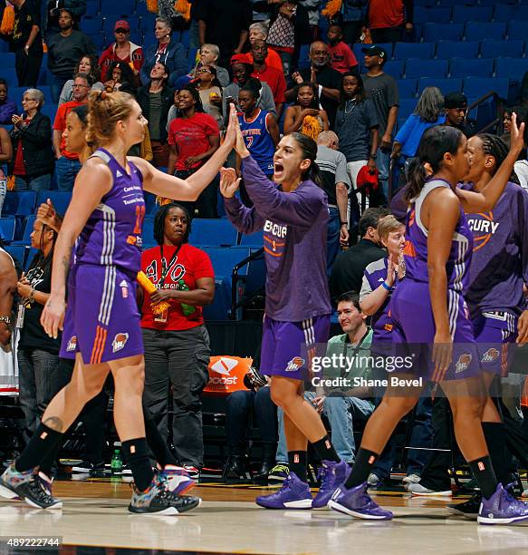 Cayla Francis and Marta Xargay Casademont of the Phoenix Mercury high five and celebrate against the Tulsa Shock during Game Two of the WNBA Western...