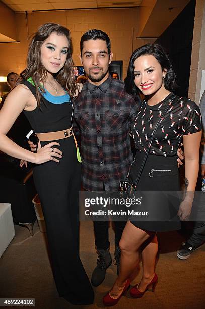 Hailee Steinfeld, Wilmer Valderrama and Demi Lovato attend the 2015 iHeartRadio Music Festival at MGM Grand Garden Arena on September 19, 2015 in Las...