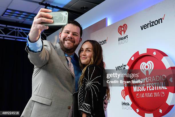 Radio personality Kane and singer Zella Day attend the 2015 iHeartRadio Music Festival at MGM Grand Garden Arena on September 19, 2015 in Las Vegas,...