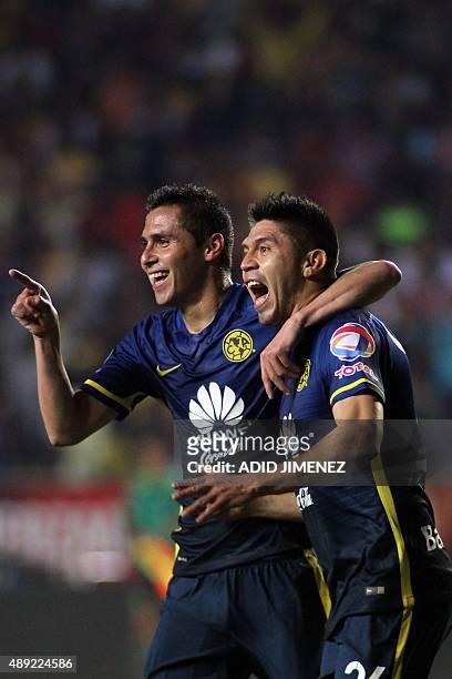 Oribe Peralta of America celebrates his goal against Morelia with his teammate Paul Aguilar , during their Mexican Apertura 2015 tournament football...