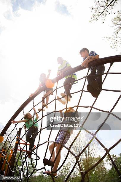 elementary children play at school recess or park on playground. - jungle gym stock pictures, royalty-free photos & images