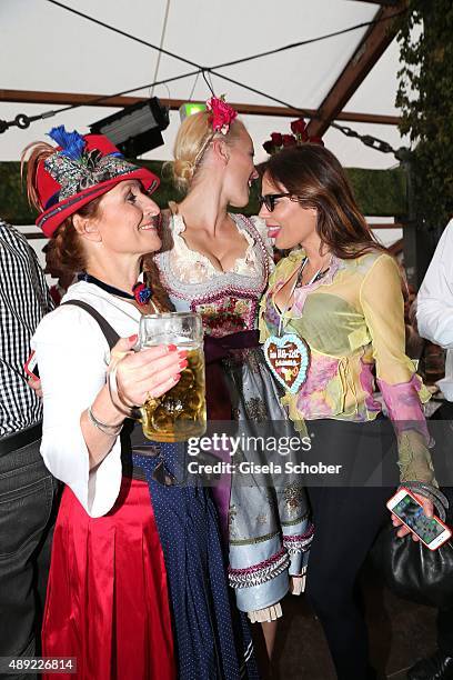 Birgitt Wolff, Franziska Knuppe and Naike Rivelli during the Oktoberfest 2015 Opening at Hofbraeu beer tent at Theresienwiese on September 19, 2015...