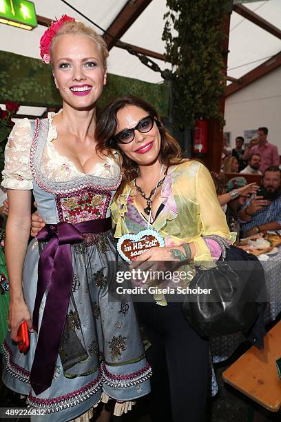 Franziska Knuppe and Naike Rivelli during the Oktoberfest 2015 Opening at Hofbraeu beer tent at Theresienwiese on September 19, 2015 in Munich,...