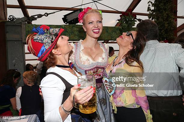 Birgitt Wolff, Franziska Knuppe and Naike Rivelli during the Oktoberfest 2015 Opening at Hofbraeu beer tent at Theresienwiese on September 19, 2015...