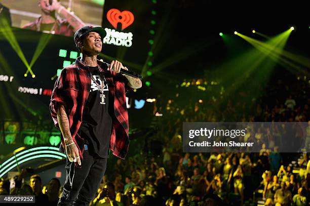 Rapper Tyga performs onstage at the 2015 iHeartRadio Music Festival at MGM Grand Garden Arena on September 19, 2015 in Las Vegas, Nevada.