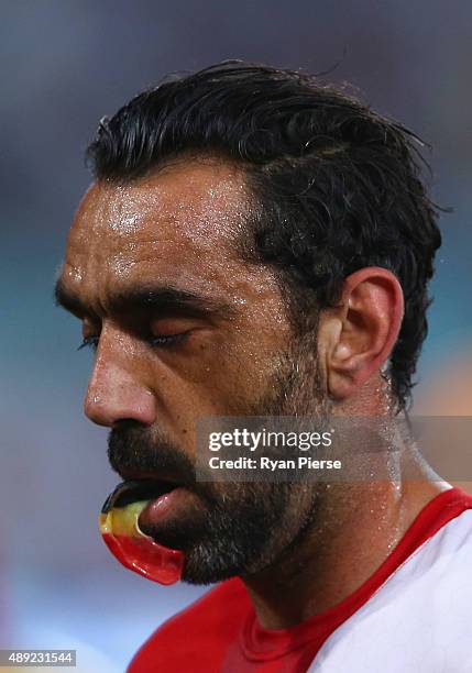 Adam Goodes of the Swans looks on during the First AFL Semi Final match between the Sydney Swans and the North Melbourne Kangaroos at ANZ Stadium on...