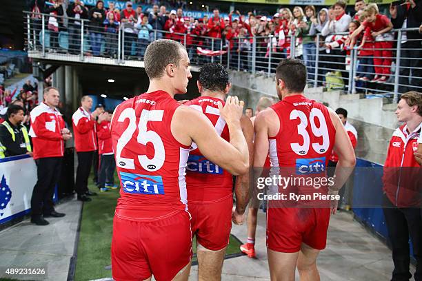 Adam Goodes of the Swans walks from the ground after the First AFL Semi Final match between the Sydney Swans and the North Melbourne Kangaroos at ANZ...