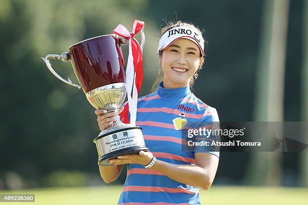 Ha-Neul Kim of South Korea poses with the trophy after winning the Munsingwear Ladies Tokai Classic at the Shin Minami Aichi Country Club Mihama...