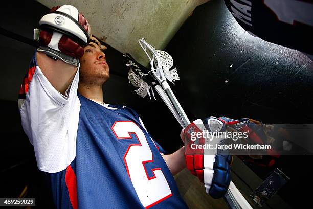 Scott Ratliff of the Boston Cannons walks out to the field prior to the game against the Denver Outlaws at Harvard Stadium on May 10, 2014 in Boston,...