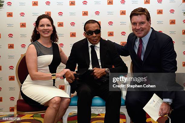 Elizabeth Conway, Muhammad Ali, and Jack Conway attends the Muhammad Ali Humanitarian Awards at Louisville Marriott Downtown on September 19, 2015 in...