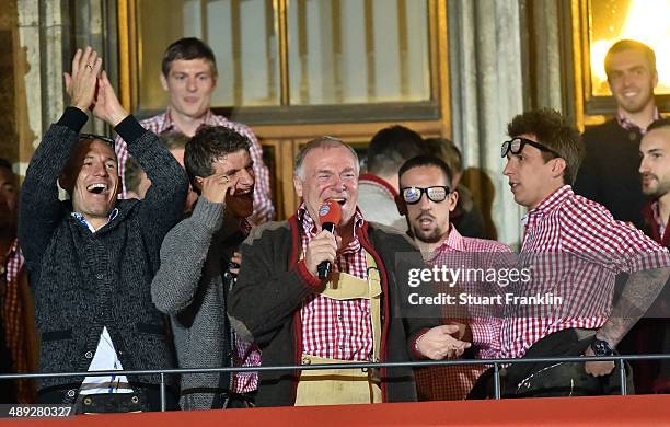 Hermann Gerland, assistant coach of FC Bayern Muenchen celebrates with the players of FC Bayern Muenchen at the Rathaus on May 10, 2014 in Munich,...