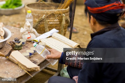 Consuming Ritual Man Performing Rice Wine Ritual High-Res Stock Photo - Getty Images