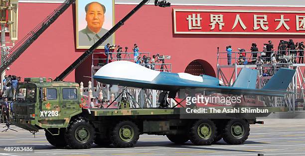 Unmanned aircraft 'BZK005' drive past the Tiananmen Square during a military parade on September 3, 2015 in Beijing, China. China is marking the 70th...