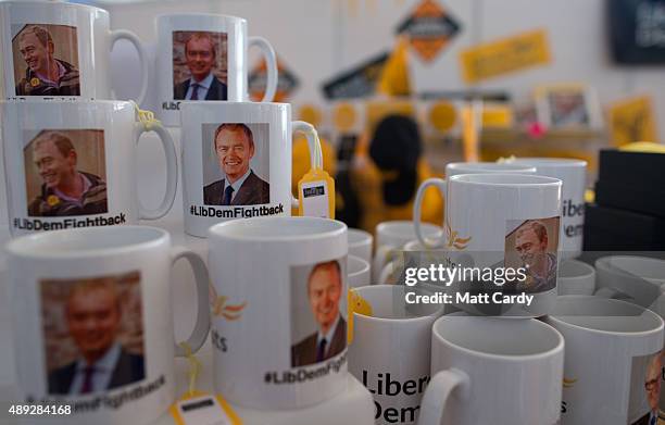 Coffee mugs displaying the picture of the leader of the Liberal Democrats Tim Farron are seen for sale on the second day of the Liberal Democrats...