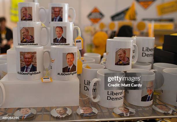 Coffee mugs displaying the picture of the leader of the Liberal Democrats Tim Farron are seen for sale on the second day of the Liberal Democrats...