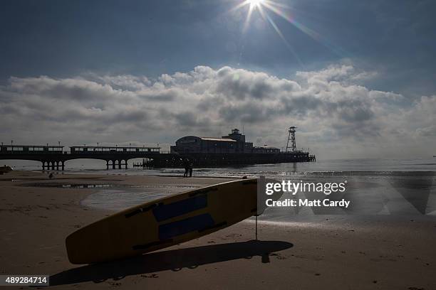 People enjoy the fine weather as Liberal Democrats supporters take part in a beach clean on the second day of the Liberal Democrats annual conference...