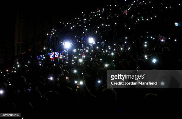 Fans hold up lights during Day Three of the Davis Cup Semi Final match between Great Britain and Australia at Emirates Arena on September 20, 2015 in...