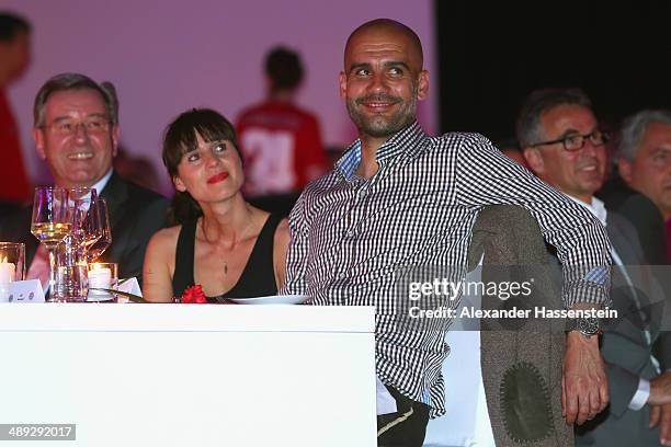 Josep Guardiola, head coach of Bayern Muenchen attends with his wife Cristina Serra the official Champions party at Postpalast on May 10, 2014 in...