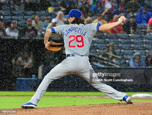 Jeff Samardzija of the Chicago Cubs throws a second inning pitch in the rain against the Atlanta Braves at Turner Field on May 10, 2014 in Atlanta,...