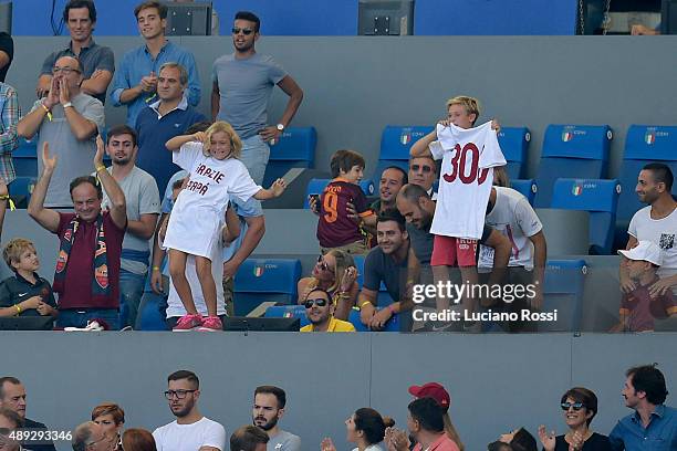 Francesco Totti's children, Chanel and Cristian, celebrate after their father scored during the Serie A match between AS Roma and US Sassuolo Calcio...