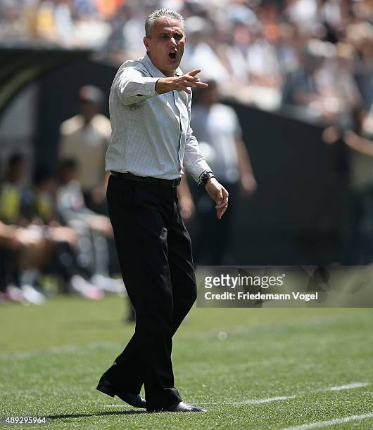 Head coach Adenor Leonardo Bachi of Corinthians gives advise during the match between Corinthians and Santos for the Brazilian Series A 2015 at Arena...