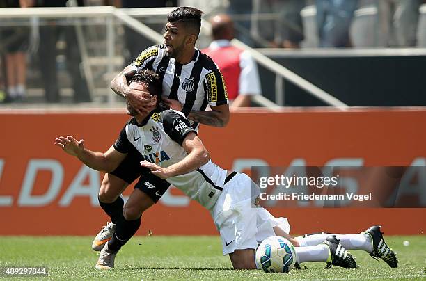 Felipe of Corinthians fights for the ball with Gabriel of Santos during the match between Corinthians and Santos for the Brazilian Series A 2015 at...