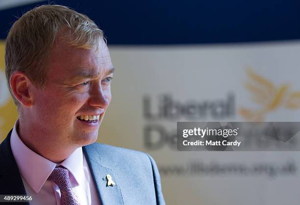 Leader of the Liberal Democrats Tim Farron visits the trade and exhibition stands on the second day of the Liberal Democrats annual conference on...