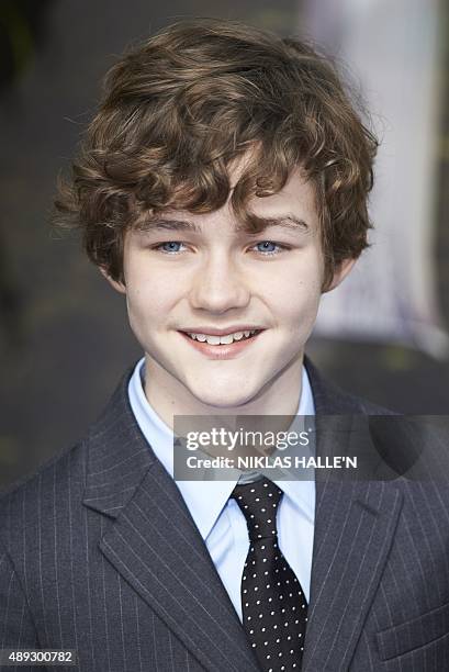 Australian actor Levi Miller poses for photographers as he arrives for the World Premiere of "PAN" in London's Leicester Square on September 20,...