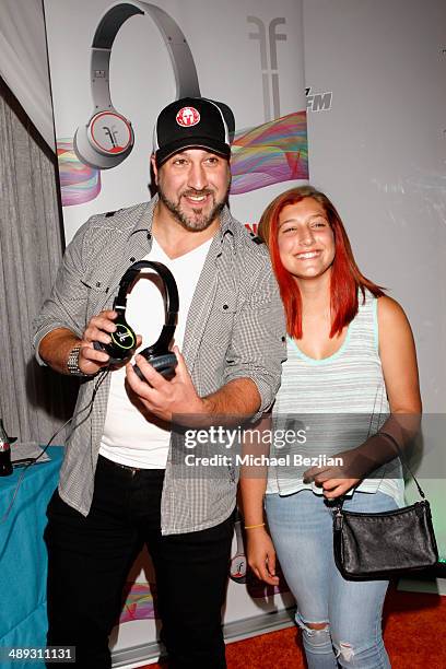 Singer Joey Fatone and Briahna Joely Fatone with Flips Audio, the exclusive headphone sponsor of 102.7 KIIS FM's 2014 Wango Tango, backstage at...