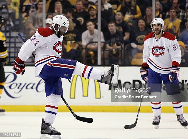 Subban of the Montreal Canadiens celebrates his third period goal against the Boston Bruins along with Max Pacioretty during Game Five of the Second...