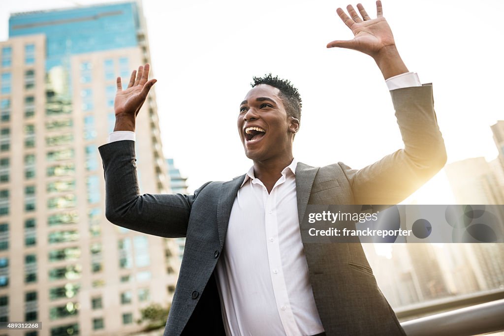 Successful business man against the skyscraper