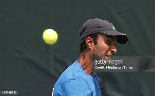 Indian tennis player Yuki Bhambri in action against Czech tennis player Jiri Vesely during a Davis Cup World Group play-off tennis match at R. K....